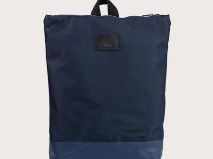 Stylish waterproof backpack with blue leather bottom, perfect for work or outdoor use.