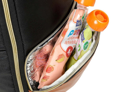 Close-up of a large diaper backpack pocket holding baby food pouches and snacks.