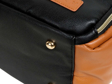 Close-up of the large black coffee diaper backpack showing high-quality PU material and stylish design details.