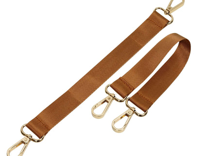 Adjustable brown fabric straps with golden clips for bags and accessories.