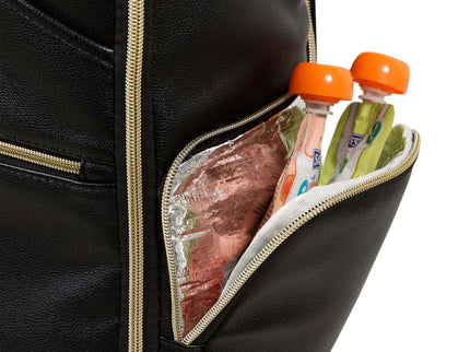 Close-up of the insulated pocket of a large black diaper backpack with snacks and drink pouches visible.