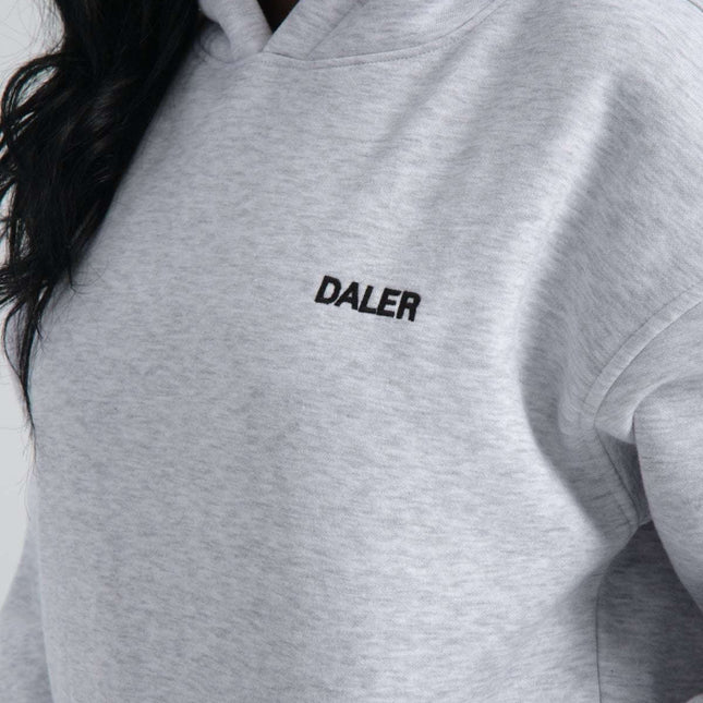 Oversize grey melange hoodie with DALER embroidery on chest, made of 80% cotton, 20% polyester, for women.