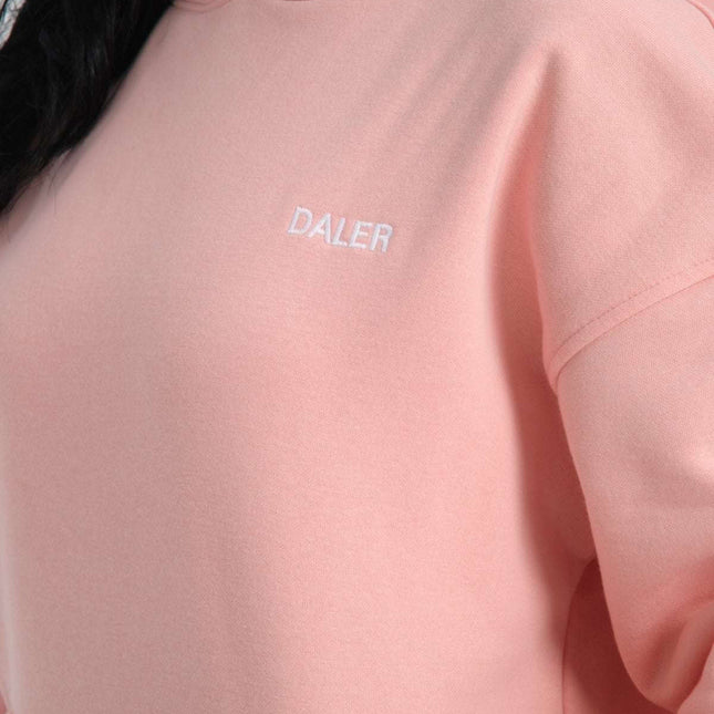 Basic Heavyweight Hoodie in Pink with DALER embroidery on the chest, showcased on a model.