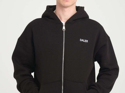Basic heavyweight black zipper hoodie with DALER embroidery, oversized fit, worn by male model in studio.