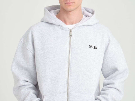 Basic heavyweight zipper hoodie in grey melange on male model with DALER embroidery, perfect for casual wear.