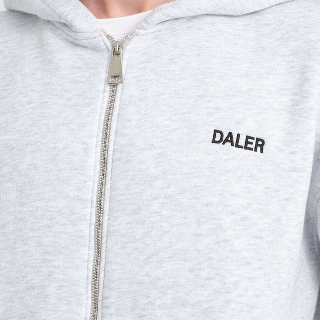Close-up of Basic Heavyweight Zipper Hoodie in Grey Melange with DALER embroidery on chest.