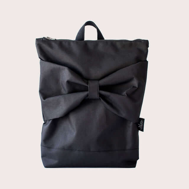 Stylish waterproof black backpack with a large bow, perfect for work and everyday use.