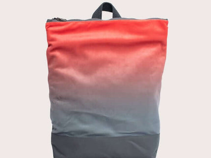 Faux leather salmon gradient backpack, stylish design with adjustable straps for daily use.