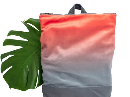 Faux leather salmon gradient backpack with adjustable straps and stylish design, perfect for daily use.