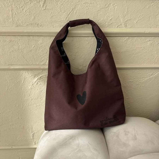 Garbanota Moon brown crescent-shaped handbag