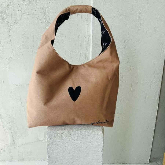Garbanota Moon cream crescent-shaped handbag