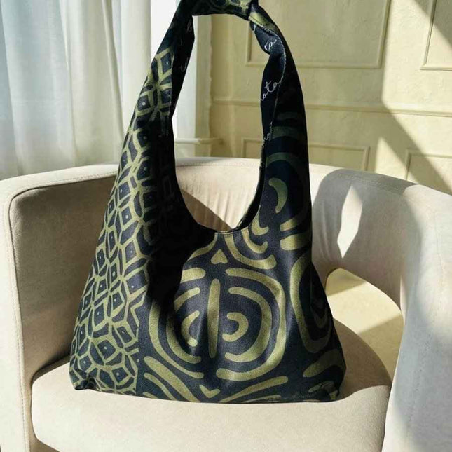 Garbanota Moon khaki pattern crescent-shaped handbag