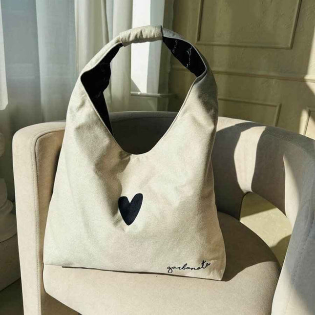 Garbanota Moon white crescent-shaped handbag