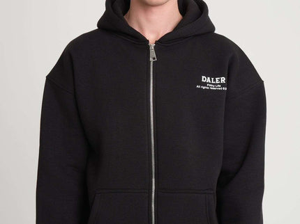 Heavyweight zipper hoodie in black, front view, featuring a relaxed fit and zip closure.
