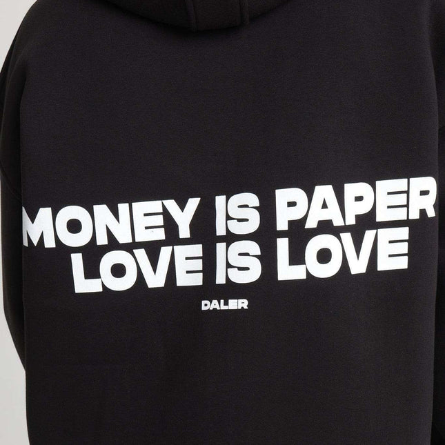Back of heavyweight zipper hoodie with 'Money is Paper, Love is Love' slogan in bold white letters
