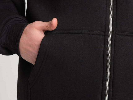 Close-up of heavyweight zipper hoodie showcasing front pockets and quality fabric, perfect for cozy, casual wear.