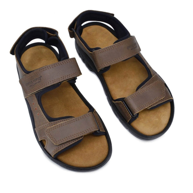 Lauri Leather Sandals in brown, featuring a sporty design, adjustable straps, and natural leather construction.