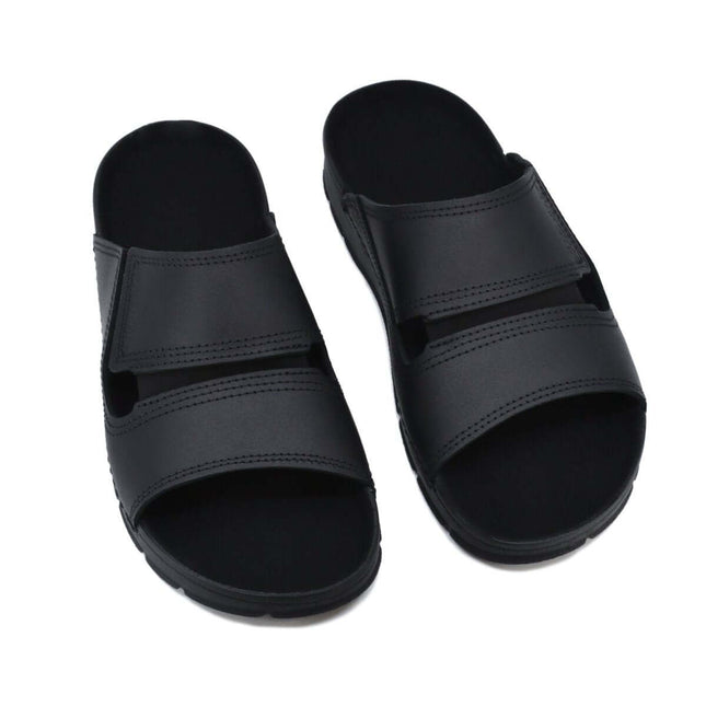 Miku Sandals in Black - Minimalist slip-on leather design for comfort and versatility, handmade in Estonia.