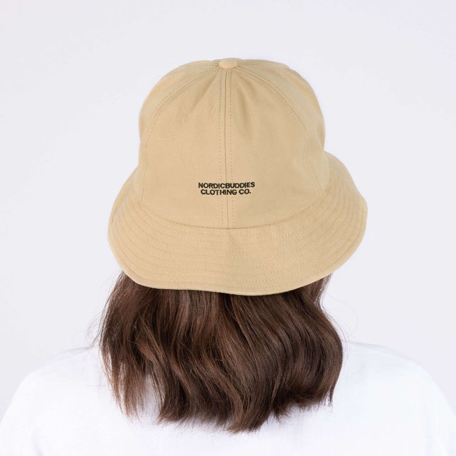 Beige Pippi Longstocking bucket hat by Nordicbuddies, showcasing the brand logo on the back.