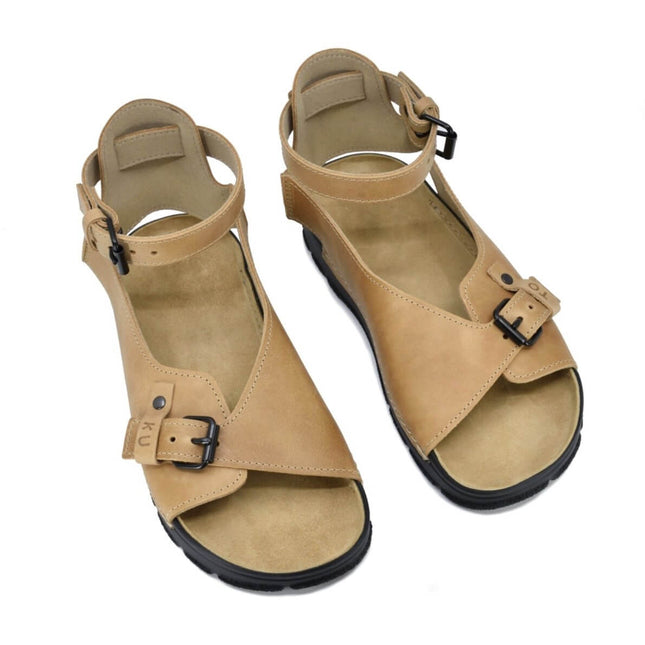 TOKU Athens Sandals in beige with adjustable ankle strap and closed heel for comfort and style.