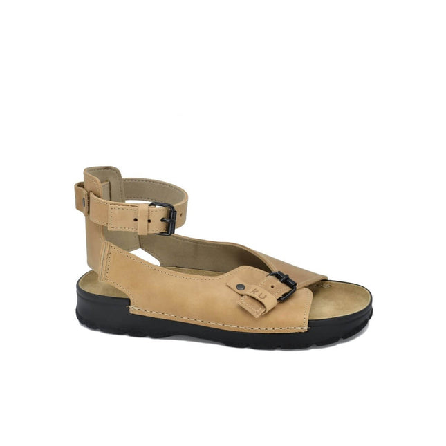 TOKU Athens Sandals in beige with adjustable ankle strap and durable sole, inspired by ancient Greek footwear.