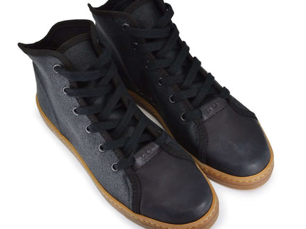 TOKU Stockholm sustainable sneakers with black textile upper and rubber sole, designed for comfort and style.