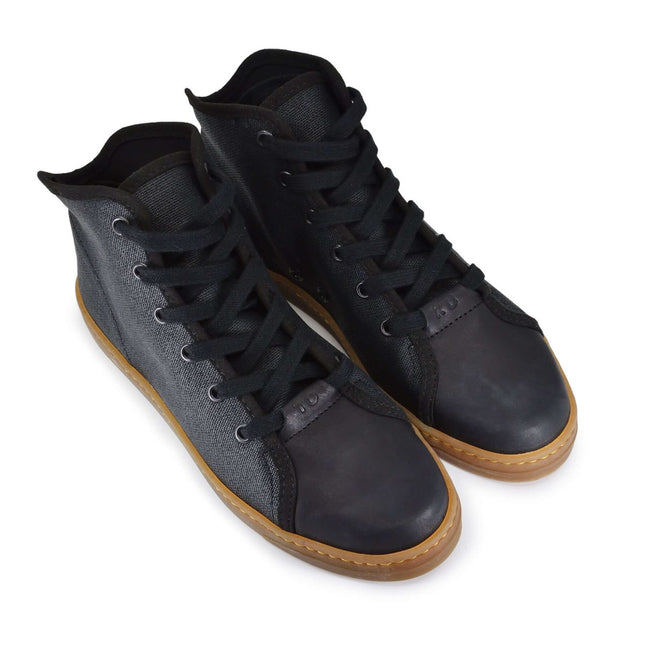 TOKU Stockholm sustainable sneakers with black textile upper and rubber sole, designed for comfort and style.