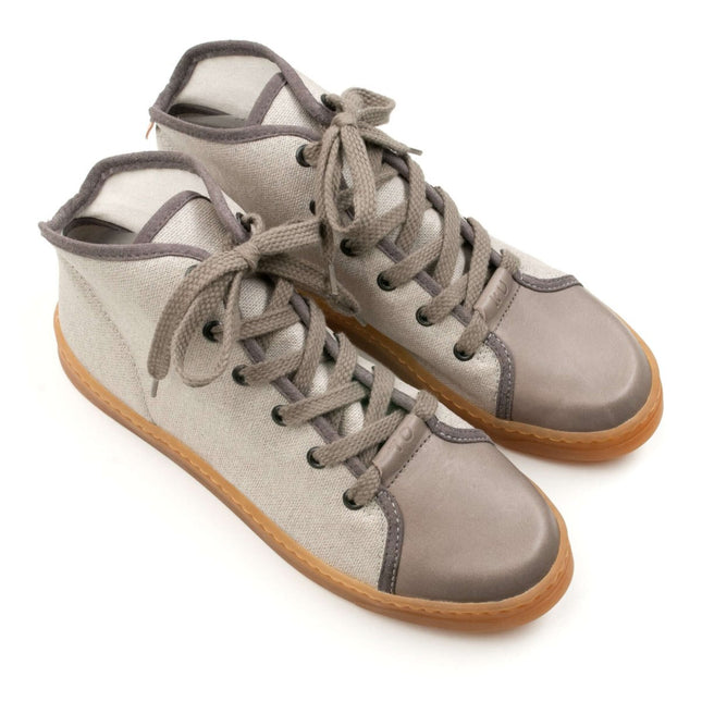 TOKU Stockholm grey high-top sneakers, designed for comfort and style, perfect for festivals and outdoor adventures.
